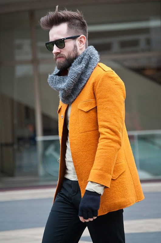 Orange coat & hipster haircut with man beard & hobo gloves