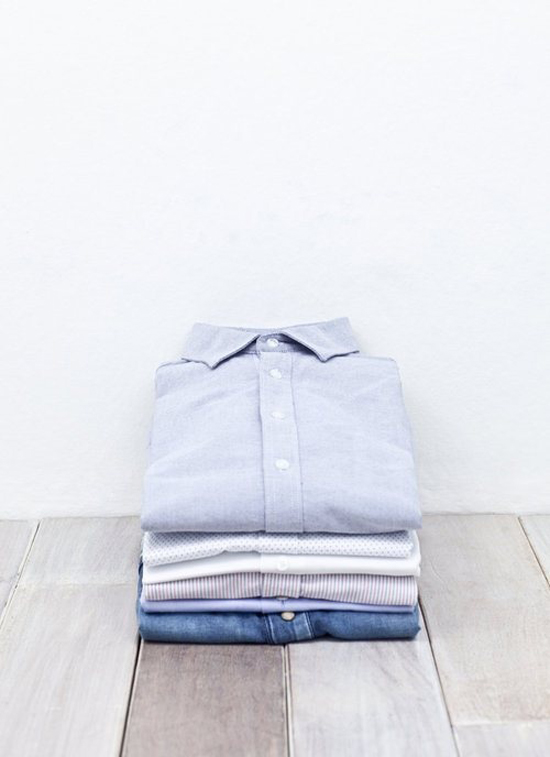 Neatly folded and stacked shirts