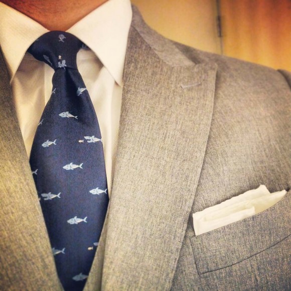 French Blue shark print tie, grey peak lapel suit jacket