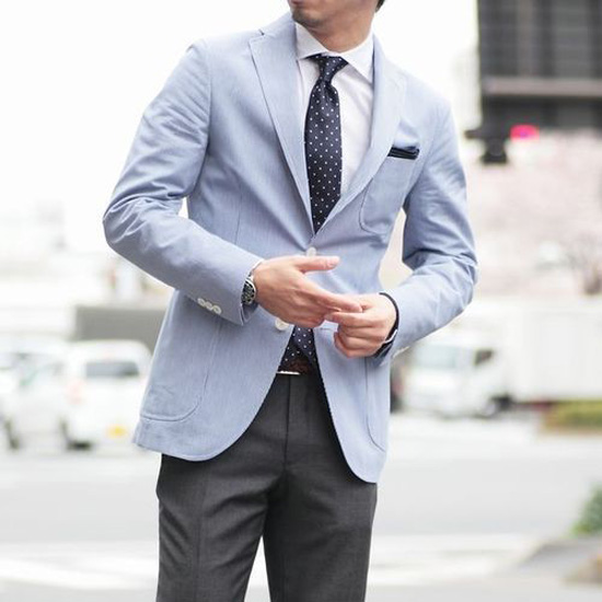 Light blue sport coat white buttons, silk polka dot tie