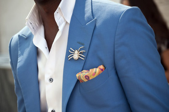 Tarantula lapel pin on suit