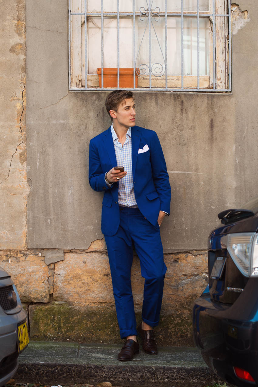 M.J. Bale Project blue suit wall lean menswear streetstyle