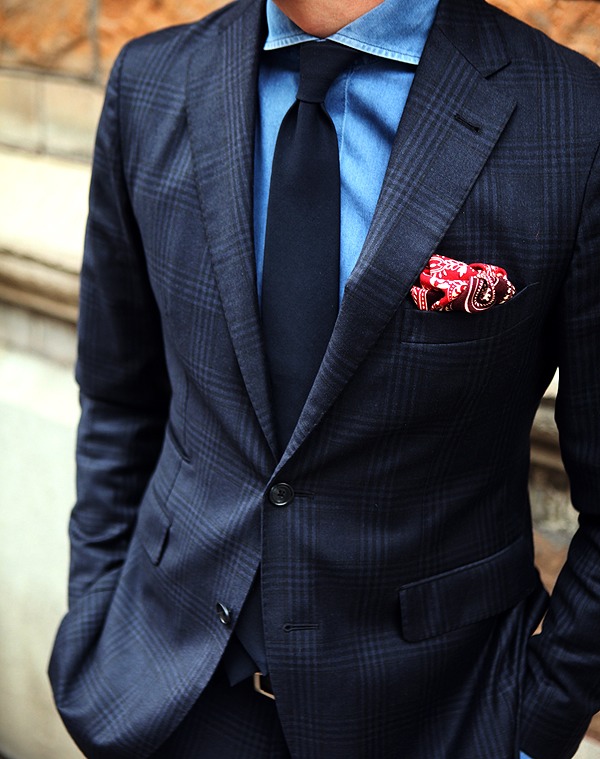 Men's dark blue suit with subtle blanket plaid pattern