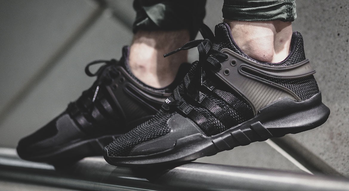 The lovely Adidas EQT Support Adv on feet in a triple black colorway