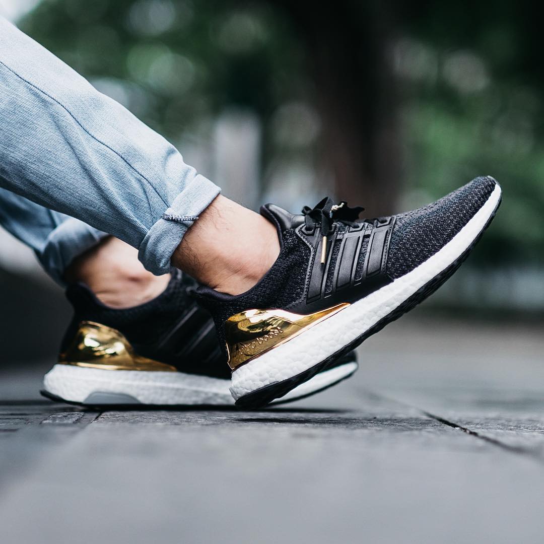 The long-awaited Black × Gold Adidas UltraBoost LTD. is finally here