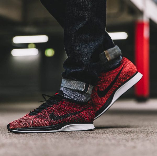 The NIKE Flyknit Racer Uni Red Low makes a statement...so you won’t ...